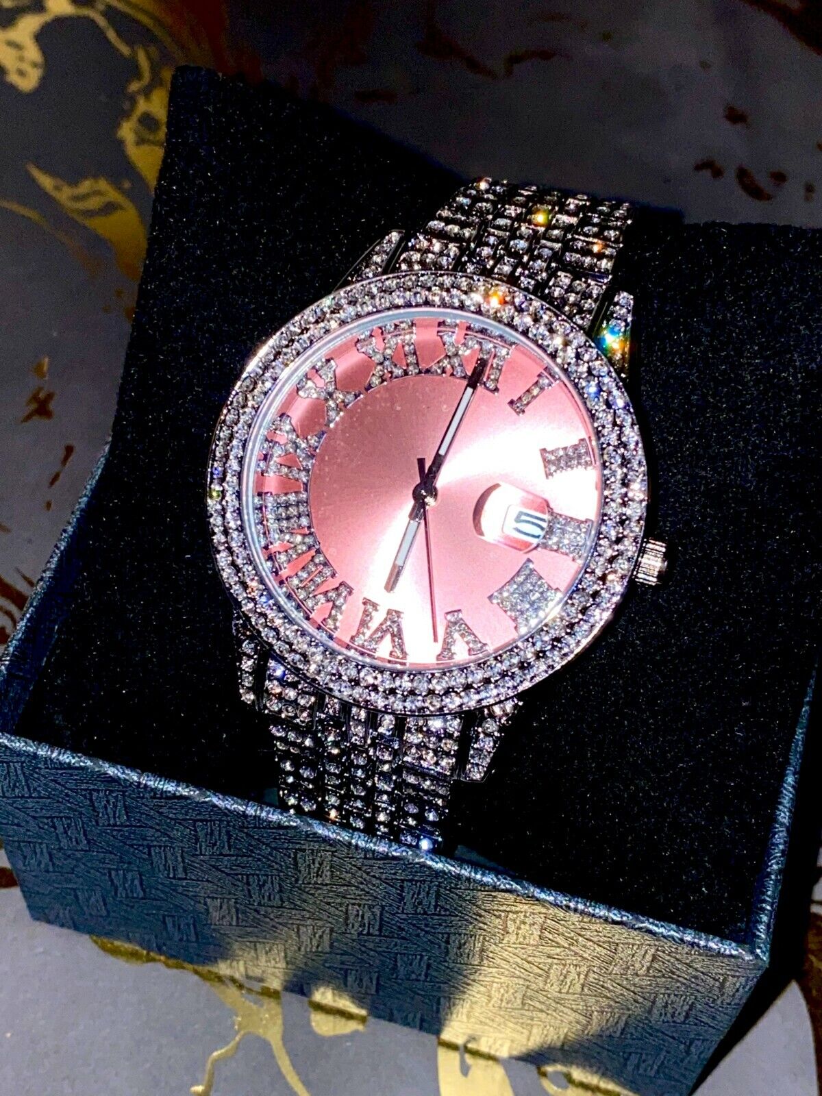 Montre glacée avec cadran en or rose